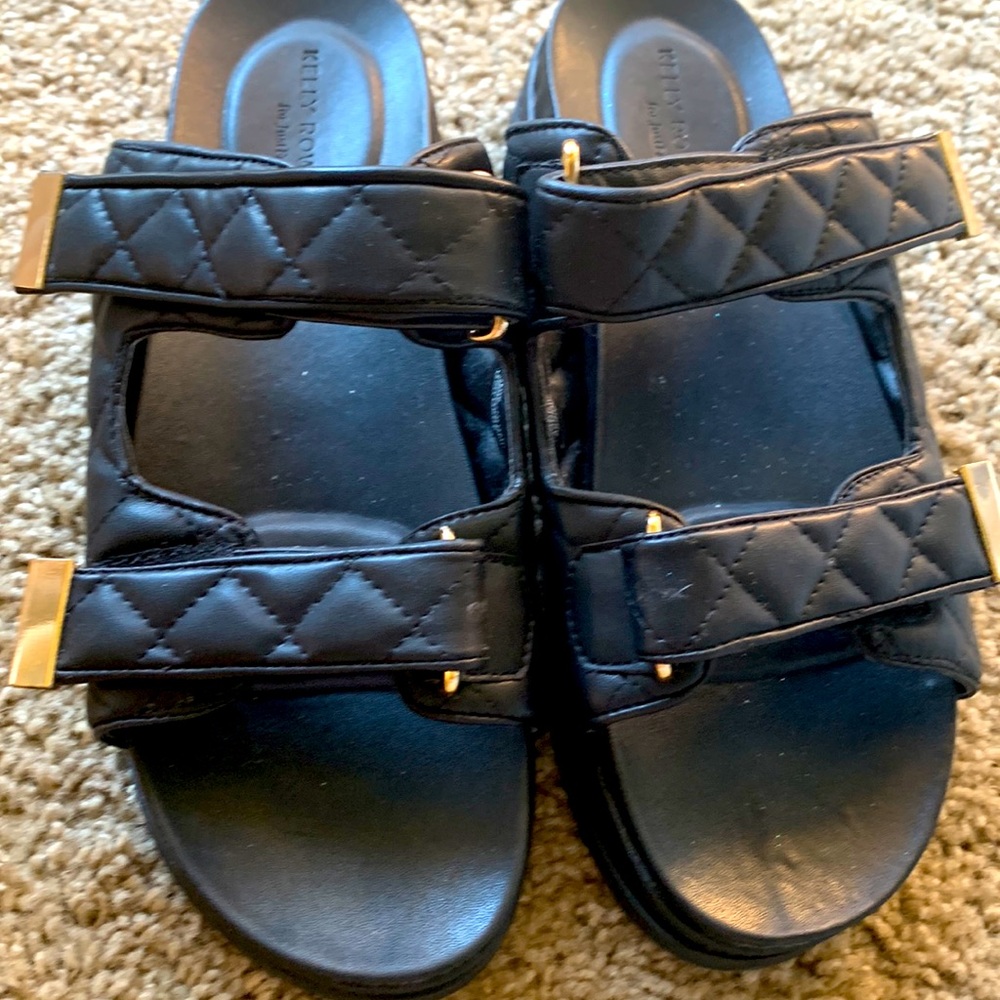 Flat black sandals